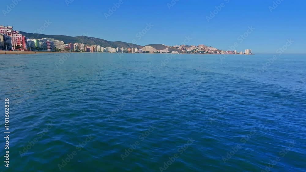 Cullera aerial view of a beautiful beach and skyline, Spain. Cullera aerial view of a beautiful beach and skyline, Spain.