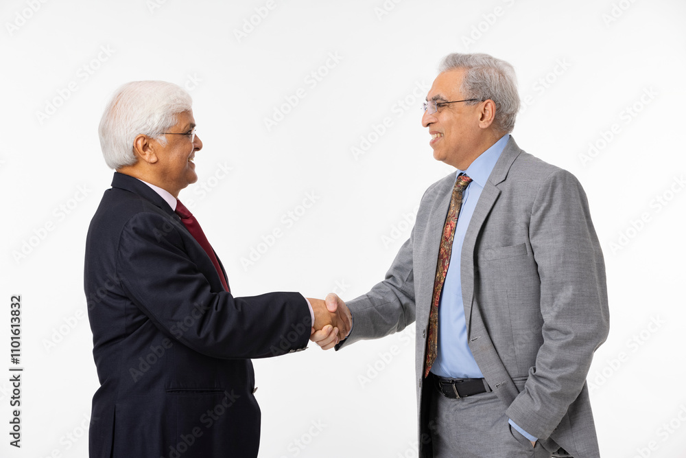 Businessmen handshake at the white background Businessmen handshake at the white background