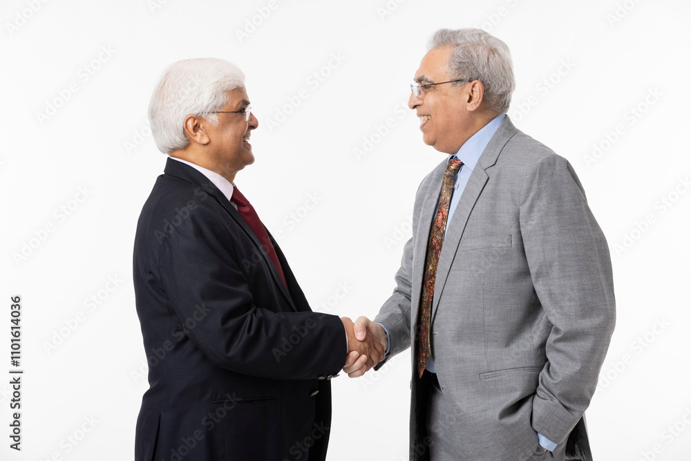 Businessmen handshake at the white background Businessmen handshake at the white background