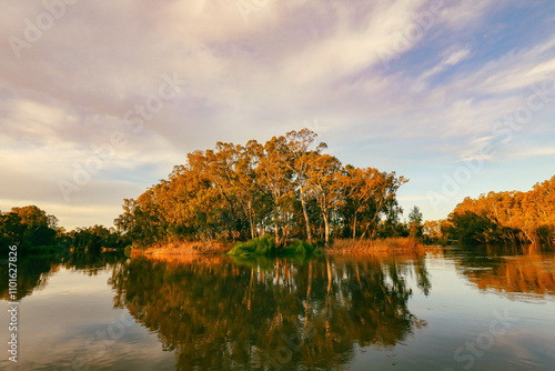 Tranquil golden afternoon along the Gunbower Creek in Koondrook Victoria photo