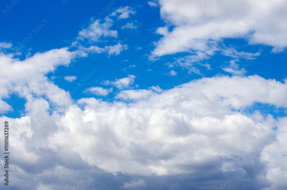 Naklejka premium White clouds in blue sky
