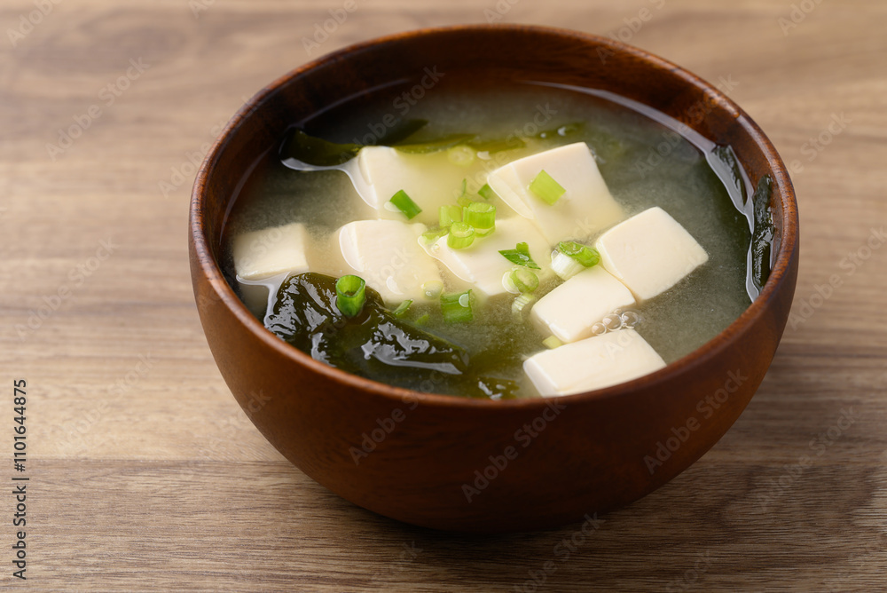 Miso soup with tofu, wakame seaweed and spring onion, Traditional Japanese soup Miso soup with tofu, wakame seaweed and spring onion, Traditional Japanese soup