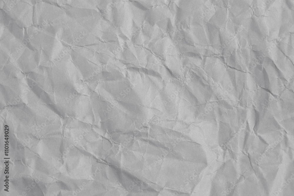 Fototapeta premium Gray glossy crumpled recycled paper texture as background