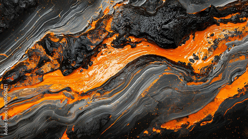 Textured lava flow with vibrant orange highlights and dark rock formations creates striking visual contrast. dynamic patterns evoke sense of energy and movement photo