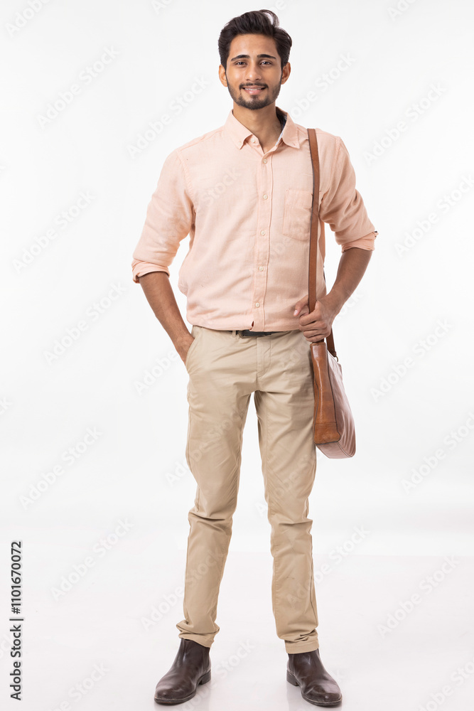 Handsome man wearing a shoulder bag at white background Handsome man wearing a shoulder bag at white background
