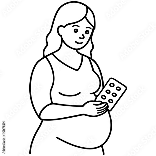 pregnant woman holding blisters of medicine