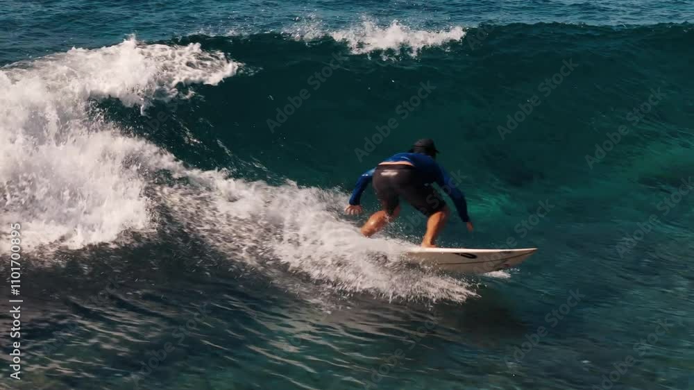 Advanced surfer rides the wave in the Maldives Advanced surfer rides the wave in the Maldives