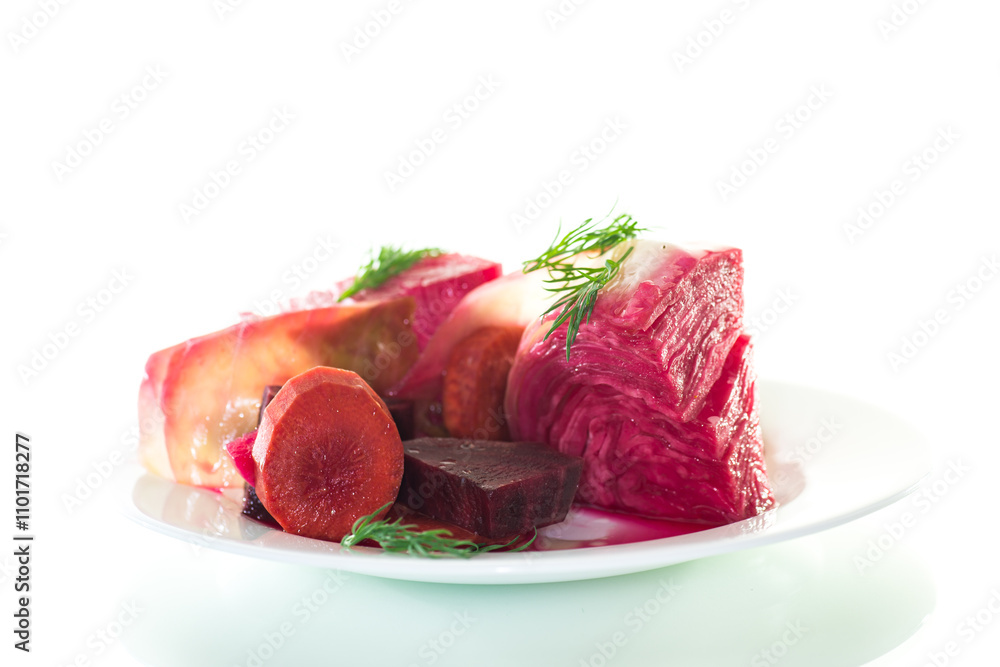 pickled cabbage with beets and carrots, in a plate, isolated on white background pickled cabbage with beets and carrots, in a plate, isolated on white background