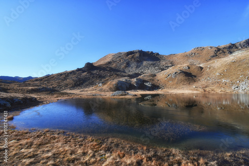 The small and colorful lake of Valfredda, in Val d'Ayas