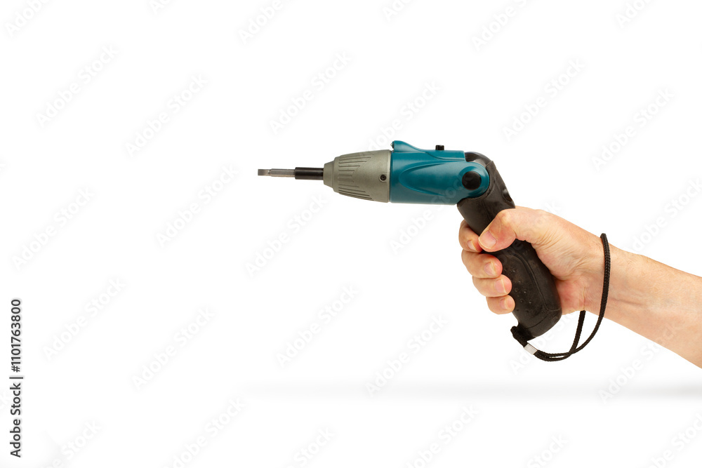 Man hand holding rechargeable electric screwdriver on a white background with copy space Man hand holding rechargeable electric screwdriver on a white background with copy space