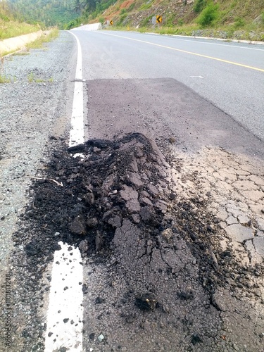 asphalt road on damaged highway