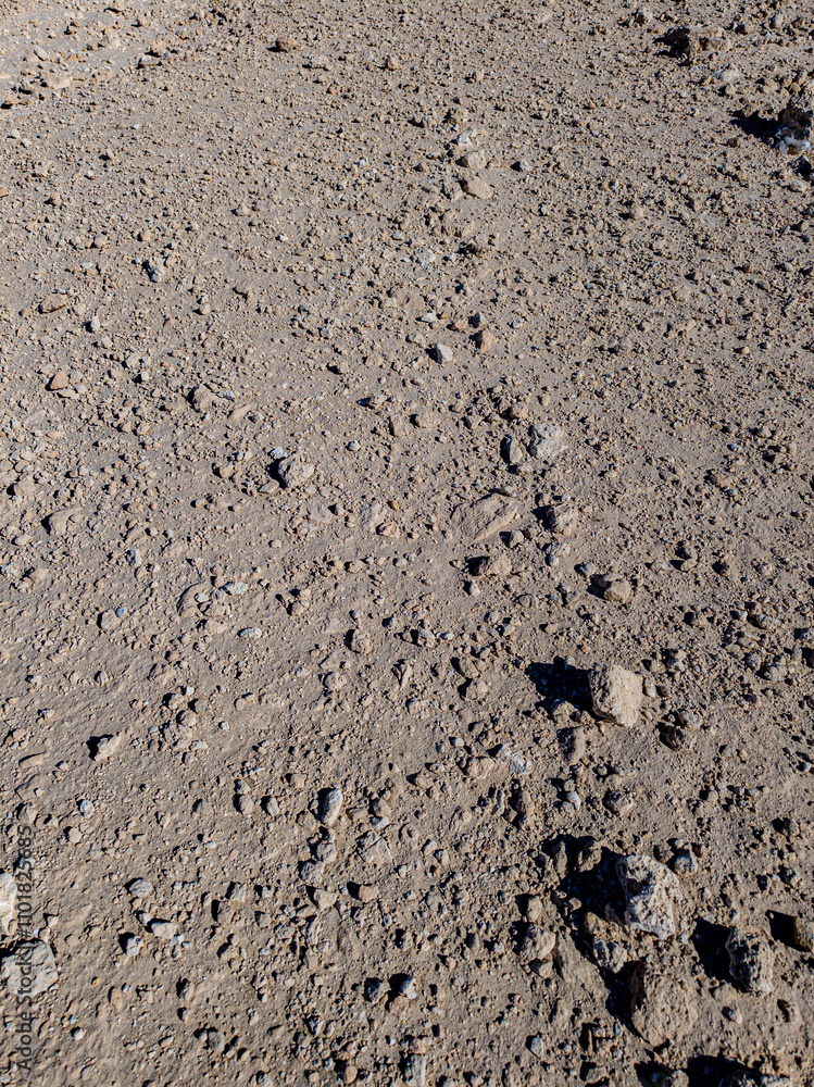 Background of stones on sand. Desert landscape. Alien view. Space surface. Day. Autumn. Egypt. Background of stones on sand. Desert landscape. Alien view. Space surface. Day. Autumn. Egypt.