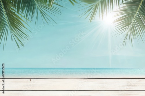 Tropical beach view with wooden deck and palm leaves under a clear blue sky a...