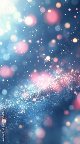 Sparkling blue and pink bokeh lights create a magical atmosphere in a soft glow