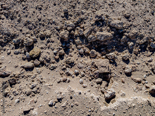 Background of stones on sand. Desert landscape. Alien view. Space surface. Day. Autumn. Egypt.