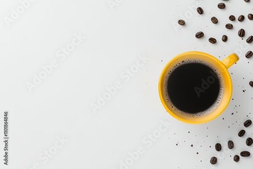 Warm cup of coffee beside scattered coffee beans on a simple white background