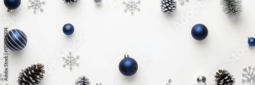 Festive decorations featuring blue and silver ornaments with snowflakes and p...