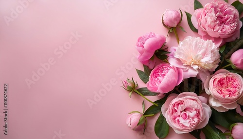 Fototapeta Naklejka Na Ścianę i Meble -   A top view photo of pink peonies and roses against a pastel pink backdrop featuring ample s_1(630)