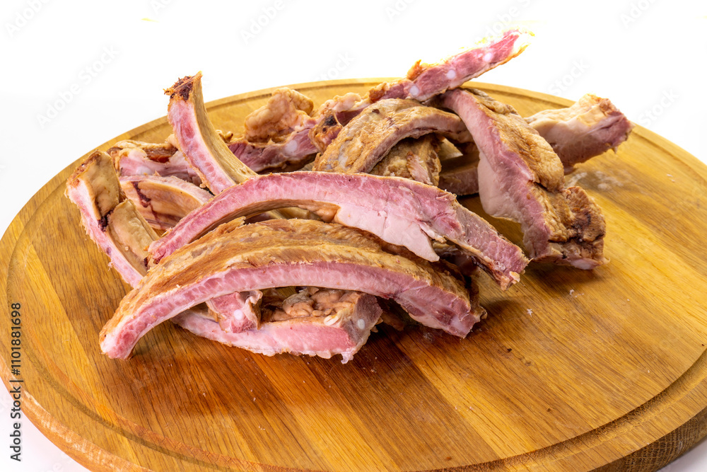 Piece of smoked pork ribs isolated on white background. meat. food concept. snacks Piece of smoked pork ribs isolated on white background. meat. food concept. snacks