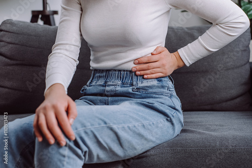 Obraz na płótnie Flatulence young woman with pain stomach ache, suffer from food poisoning, abdominal pain and colon problem, gastritis or diarrhoea