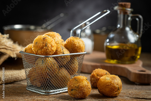 Codfish dumplings. fried dumpling, cod dumpling, fish meat, bacalao bunuelos.