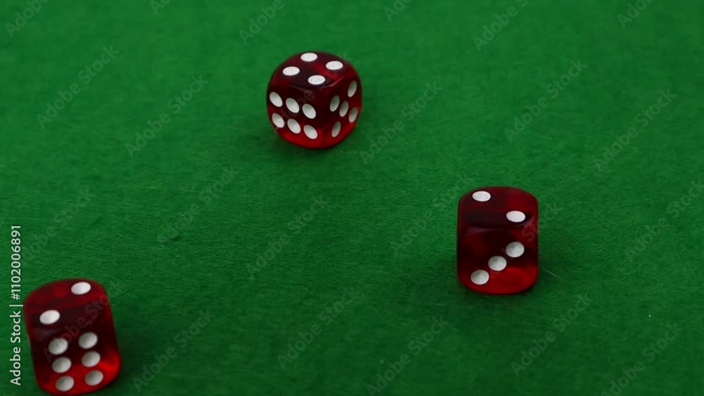 Casino dice on a green casino table close-up, slow motion of dice on a casino table Casino dice on a green casino table close-up, slow motion of dice on a casino table