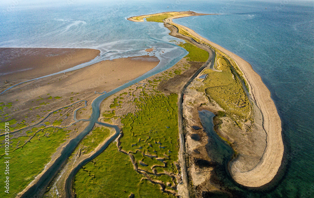 Foulney Island grass and shingle spit in Furness, N.E. of Walney Island, Cumbria. Wildfowl habitat. Tern, plover, geese, eider, dunlin, curlew etc.