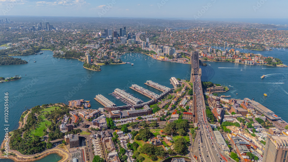 Fototapeta premium Aerial View of Sydney Harbour Balmain Darling harbour Sydney CBD cockle Bay Wharf North Sydney harbour bridge Lavender Bay Milsons Point Manly on a warm summer day blue skies 