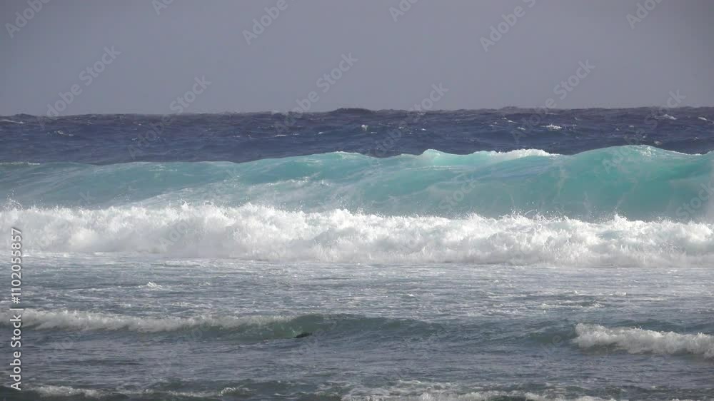 Waves on the rough sea at Rarotonga, Cook Islands in the middle of the Pacific Ocean Waves on the rough sea at Rarotonga, Cook Islands in the middle of the Pacific Ocean