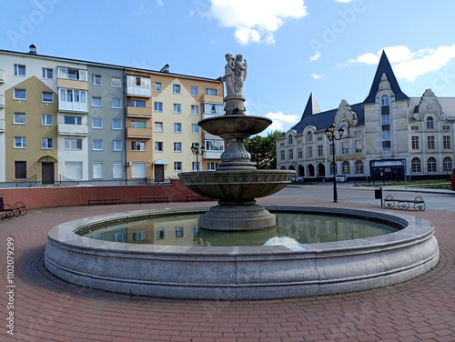 a fountain consisting of several levels and a sculpture depicting three women Chernyakhovsk 2024 July 14