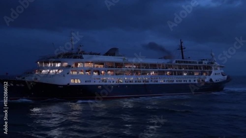 cruise ship sailing on the night ocean