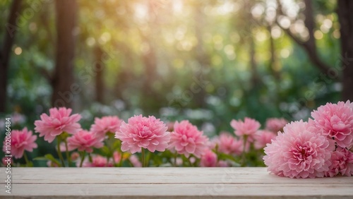 Pink flowers with rustic wood board mockup surface and flower garden sunlight bokeh background