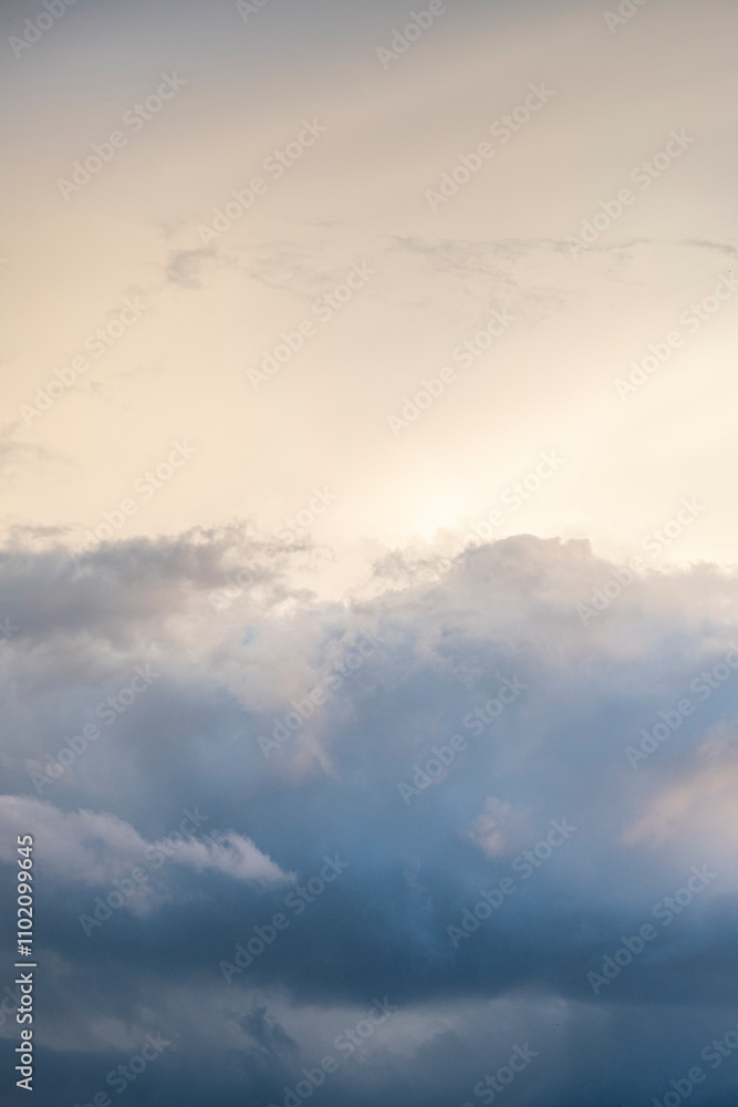 Fototapeta premium Natural cloudy sky, ornamental clouds, blue sky with light of sunshine having small and large clouds, sky with deep dark clouds and golden. Dense cloudy weather. No AI image, real photo.