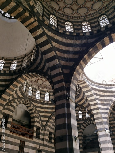 Khan As'ad Pasha Al-Azem is the largest Khan in Damascus, built in the 19th century, it features the alternating black and white stone architecture so familiar in Damascus