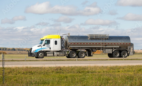 Wallpaper Mural Heavy Cargo on the Road. A truck hauling freight along a highway. Taken in Alberta, Canada Torontodigital.ca