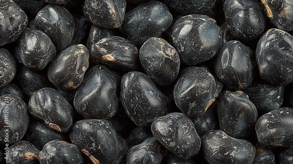 Close-up of black gram beans texture for culinary and nutrition concepts Close-up of black gram beans texture for culinary and nutrition concepts