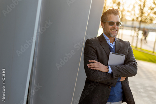 Confident businessman enjoy...