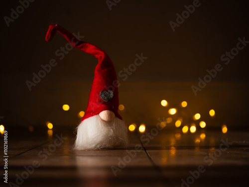 Christmas gnome with twinkling lights background bokeh