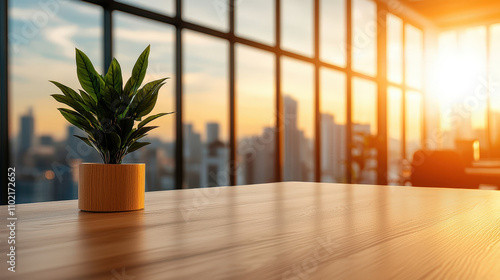 serene indoor scene featuring potted plant on wooden table, with stunning sunset view through large windows. warm light creates peaceful atmosphere