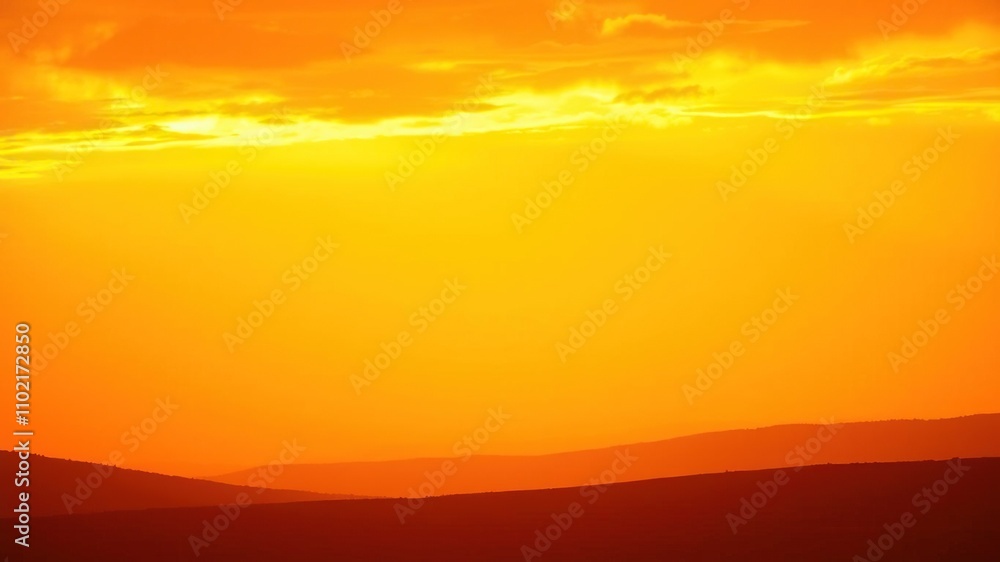 Hues of orange and yellow blending together in a gradient-like effect in the upper atmosphere casting a warm glow on the surrounding landscape, gradient, abstract Hues of orange and yellow blending together in a gradient-like effect in the upper atmosphere casting a warm glow on the surrounding landscape, gradient, abstract