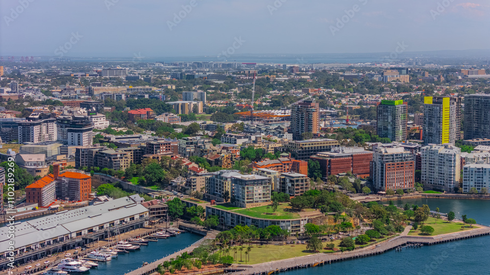 Fototapeta premium Aerial View of Sydney Harbour Balmain Darling harbour Sydney CBD cockle Bay Wharf North Sydney harbour bridge Lavender Bay Milsons Point Manly on a warm summer day blue skies 