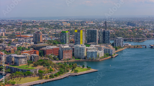 Aerial View of Sydney Harbour Balmain Darling harbour Sydney CBD cockle Bay Wharf North Sydney harbour bridge Lavender Bay Milsons Point Manly on a warm summer day blue skies 