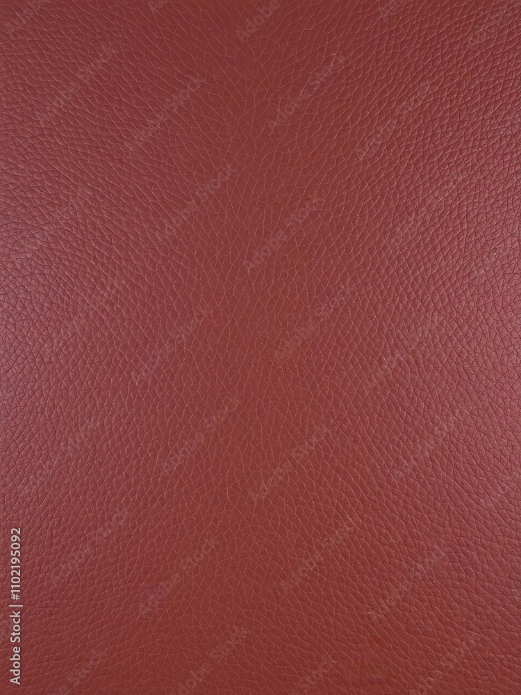 Grainy dark brown leather surface, close-up, polished Grainy dark brown leather surface, close-up, polished