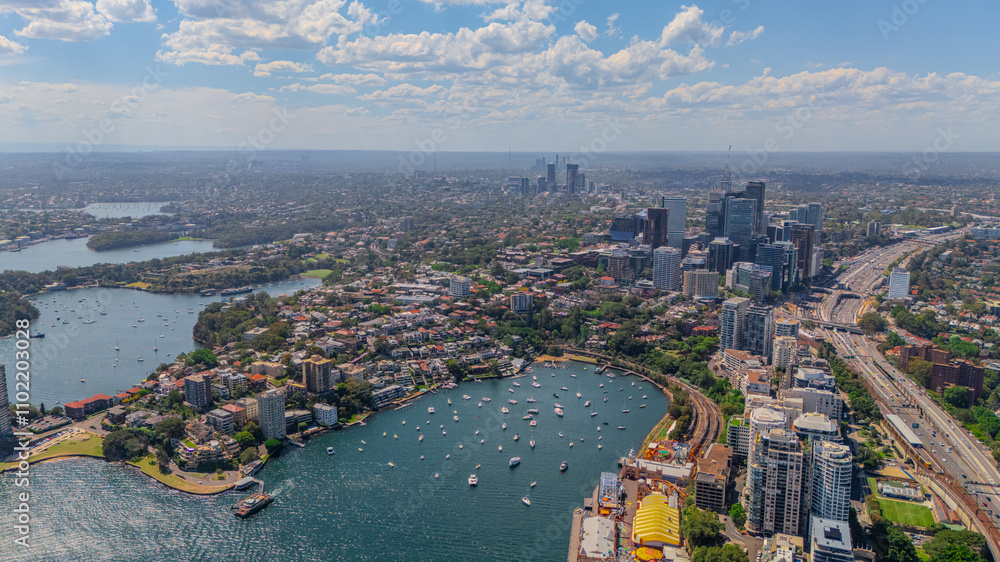 Fototapeta premium Aerial View of Sydney Harbour Balmain Darling harbour Sydney CBD cockle Bay Wharf North Sydney harbour bridge Lavender Bay Milsons Point Manly on a warm summer day blue skies