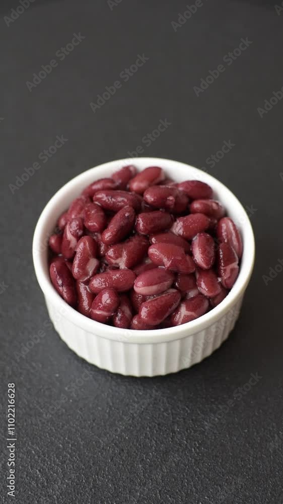 Delicious nutritious canned red beans, with salt and spices as a high-calorie breakfast addition Delicious nutritious canned red beans, with salt and spices as a high-calorie breakfast addition