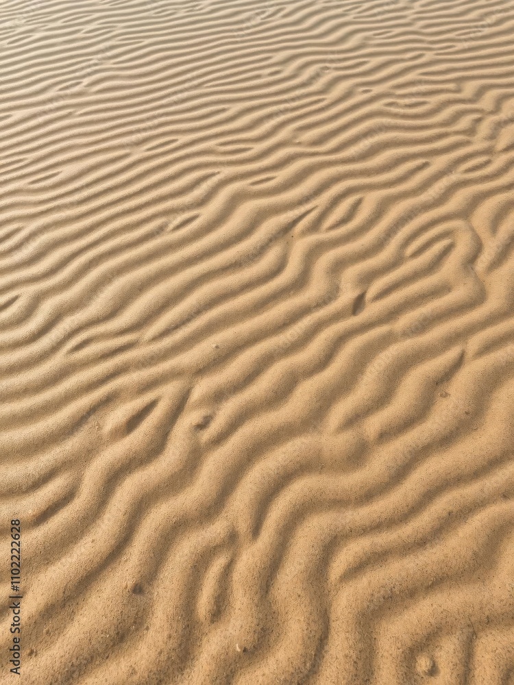 Abstract and mesmerizing patterns created by water ripples on a sandy beach, tranquil, aquatic Abstract and mesmerizing patterns created by water ripples on a sandy beach, tranquil, aquatic