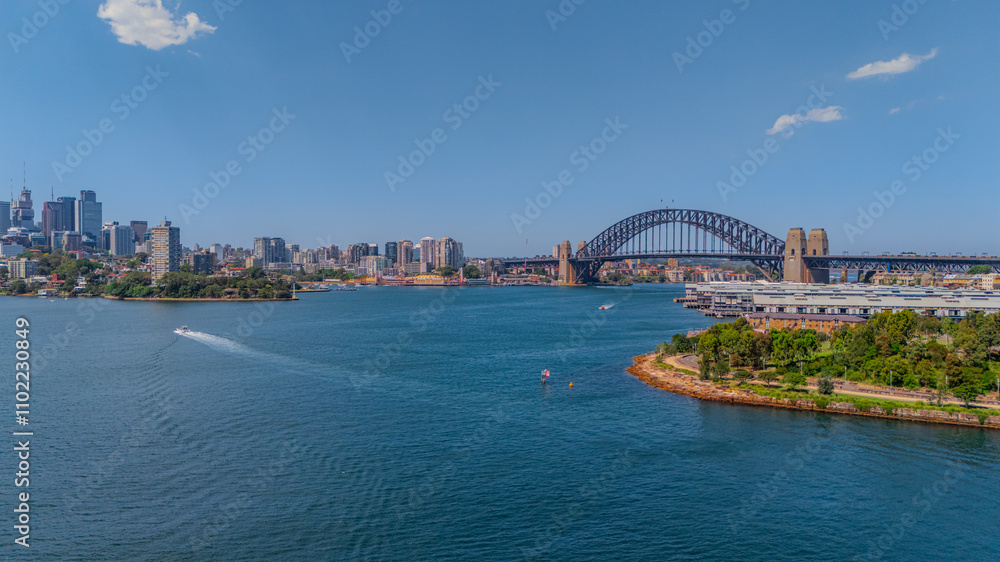 Naklejka premium Aerial View of Sydney Harbour Balmain Darling harbour Sydney CBD cockle Bay Wharf North Sydney harbour bridge Lavender Bay Milsons Point Manly on a warm summer day blue skies 