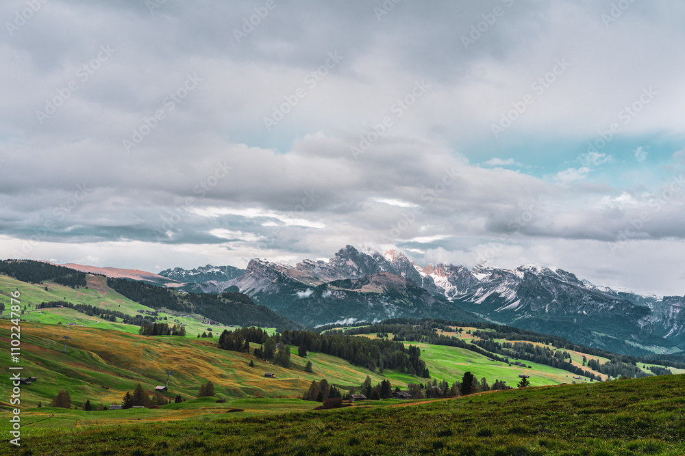 Fototapeta premium Panoramic view from the Seiser Alm to the Dolomites in South Tyrol, Italy.