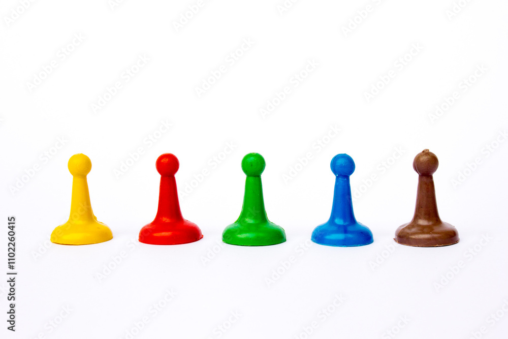 4 coloured pawns isolated on white background. 4 coloured pawns isolated on white background.