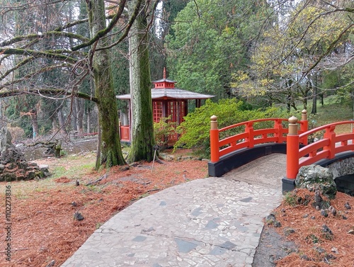 Japanese gazebo in the old park. Japanese kindergarten. The red gazebo. The Red Bridge